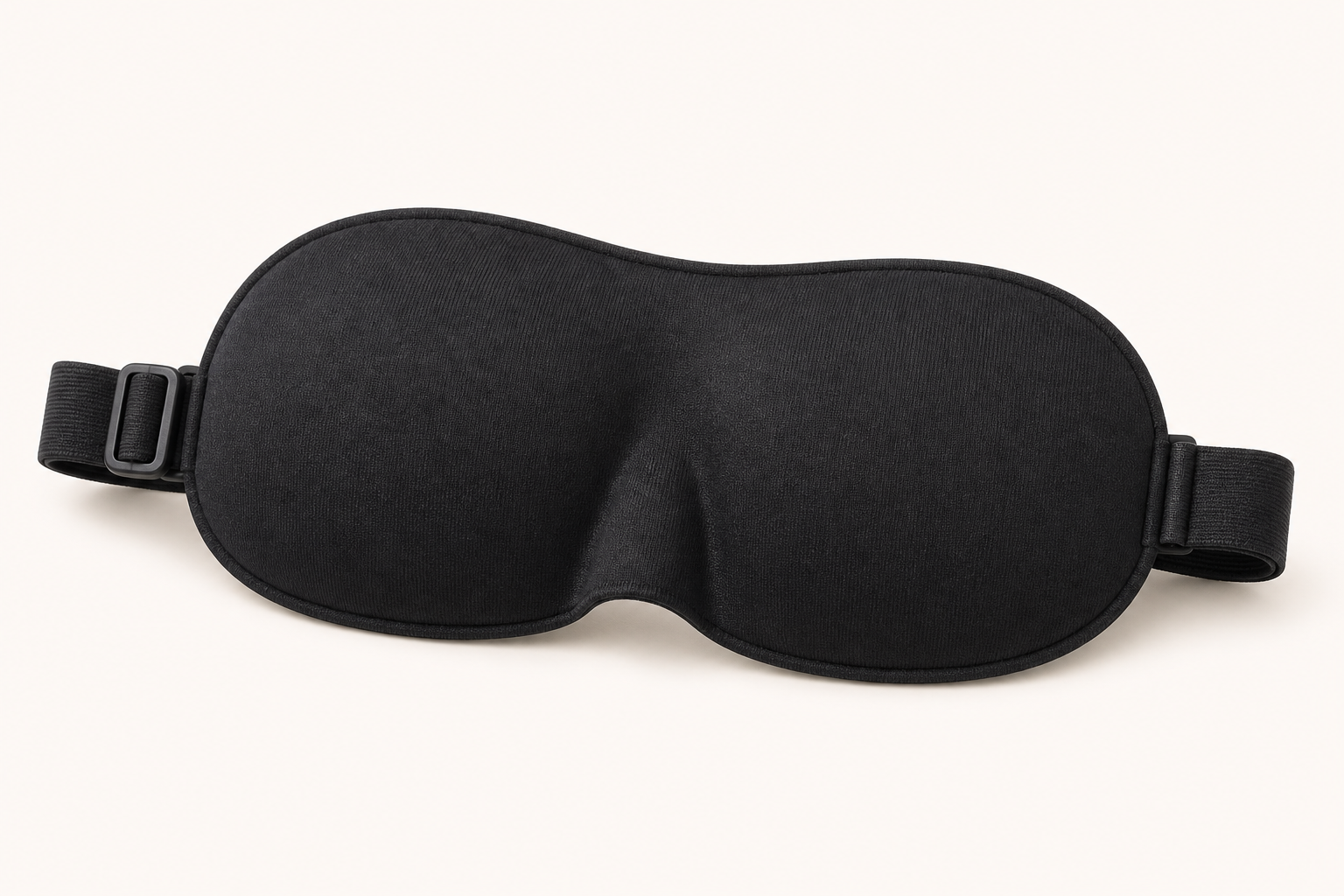 Black Xbound kids 3D sleep mask showing the contoured eye-cup profile and adjustable elastic strap